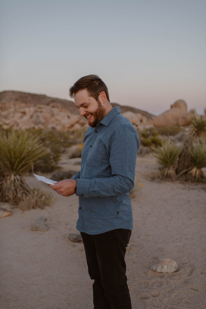 “Couple exchanging vows at sunset in Joshua Tree National Park”
“Intimate desert vow reading at golden hour”