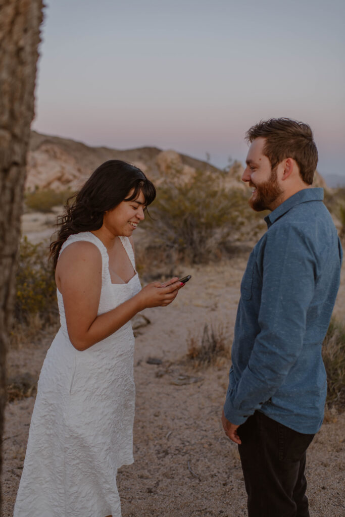 “Couple exchanging vows at sunset in Joshua Tree National Park”
“Intimate desert vow reading at golden hour”